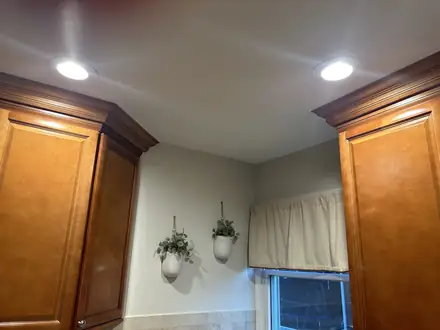The same kitchen ceiling after Walker Painting’s repair and repaint