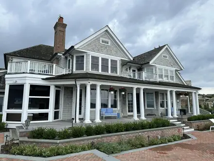 Westhampton Beach exterior before Walker Painting’s repairs and repaint